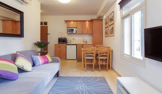 The Blue is a one-bedroom apt, on upper floor with a sleeping up to 4 guests.