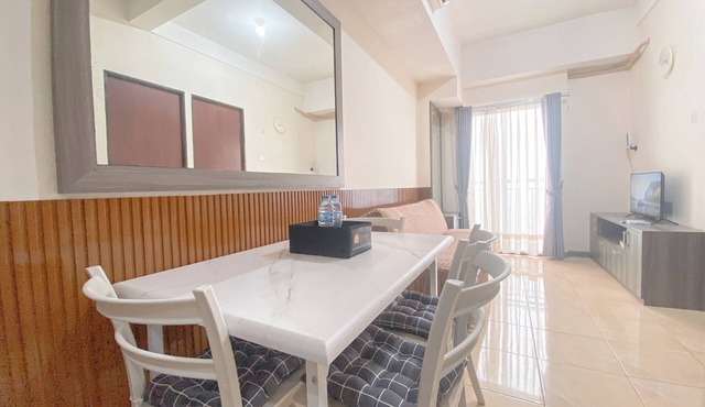 The Cozy Abode 2BR Apartment at Tamansari Panoramic