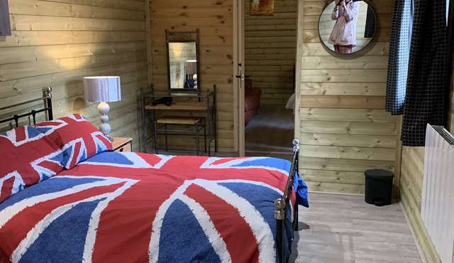 The Knapsack Is a unique wooden cabin in the stunning Frome Valley walk way