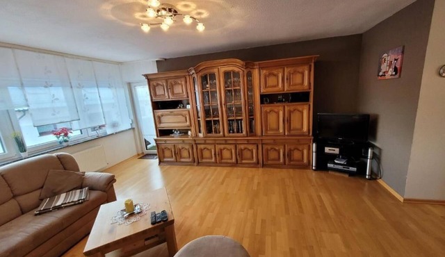 The modern vacation apartment is situated in a quiet location next to the local recreation area