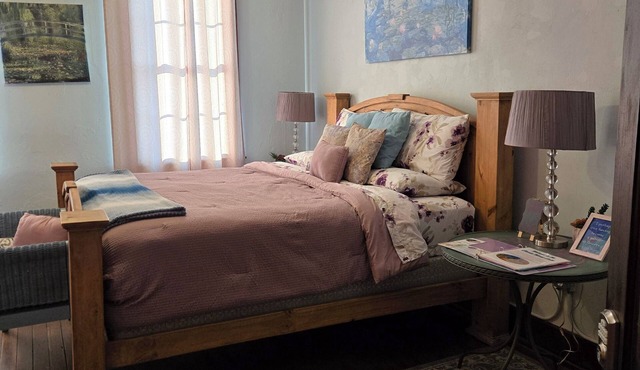 The Monet Suite is one of our four rooms.