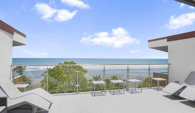 The Palms: Beachfront Condo with AC and pools!