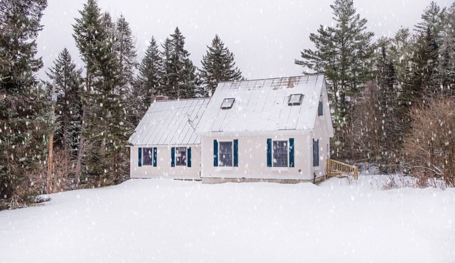 The Whimsical Chalet is a lovely cape on acres. Private setting less than 10 minutes to skiing.