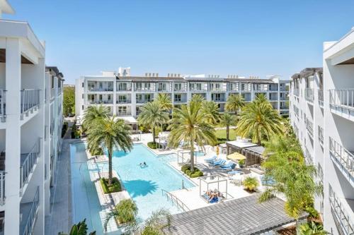 Third-floor luxury condo near beach with resort pool gym & EV chargers