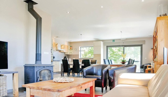 This beautiful vacation home is located in Somme-Leuze and can accommodate 14 people.