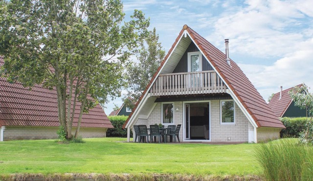 This beautifully situated vacation home is located on the waterfront in a welcoming vacation park in