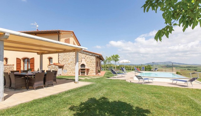 This charming vacation home with private pool is situated in a splendid panoramic position on a hill