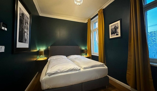 This cozy duplex apartment offers everything you need for a comfortable stay.