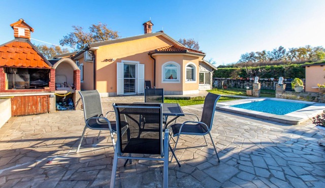 This cozy vacation home with private pool is located in the small village of Pobegi, surrounded by o