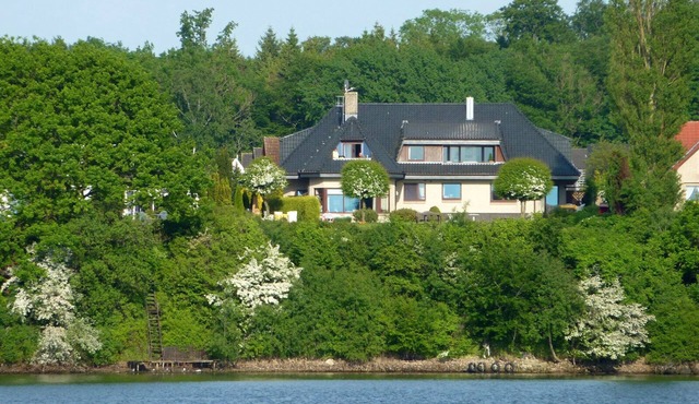 This large vacation apartment "Fischreiher 1" with waterfront property, rowing boat and in-house bicycles is one of the most beautiful vacation residences on the Baltic Sea fjord Schlei