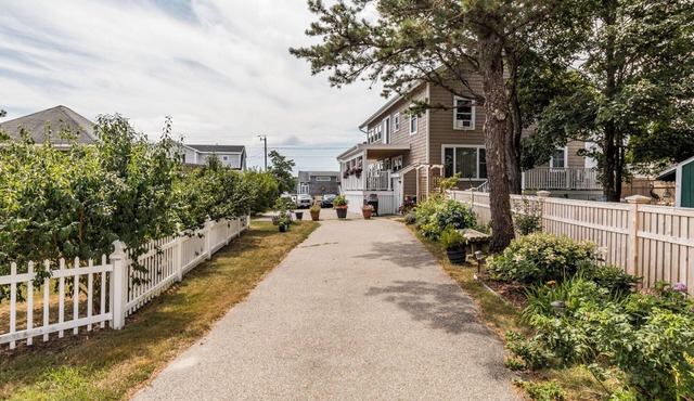 This one bedroom attached unit is three houses from the beach, with ocean views from the bedroom