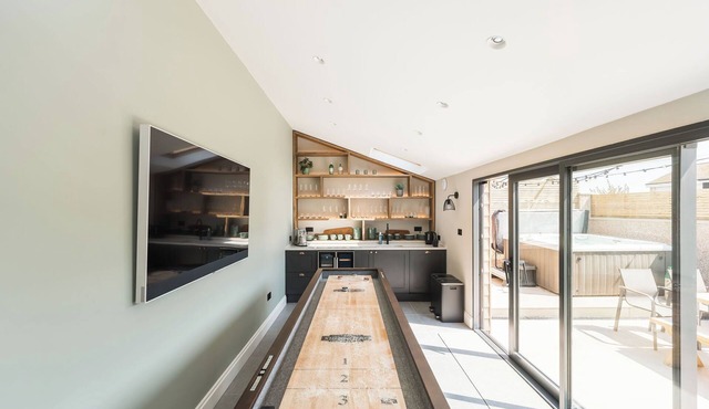This recently renovated coastal oasis combines contemporary comfort with beach-chic style