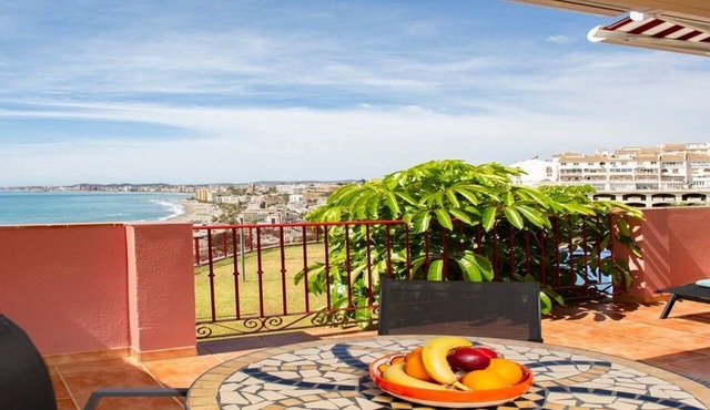 This seaside apartment is perfect for relaxation with its terrace offering sea views and soothing wave sounds. It features two bedrooms, two fully equipped bathrooms, a spacious living room, and a kitchen. Enjoy meals or sunbathe on the loungers