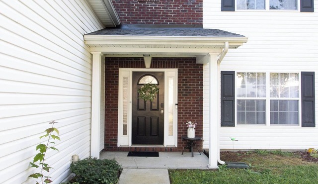 This Spacious 4-bedroom pet friendly house with WiFi and AC in charming Concord.
