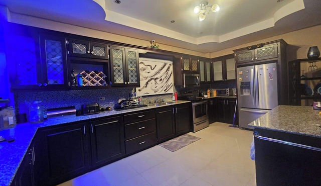 This spacious property features a fully equipped kitchen, and an inviting small pool