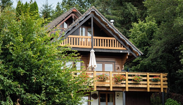 This spacious two-story wooden Finnish chalet accommodates up to 6 people across three comfortable bedrooms, making it perfect for larger families or holidays with friends.