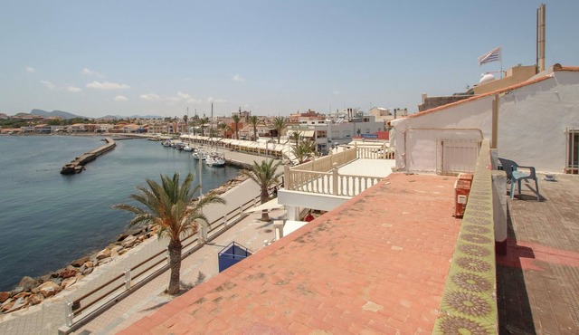 This spacious vacation row house is located in the port of Cabo de Palos, just 2 minutes walk from t
