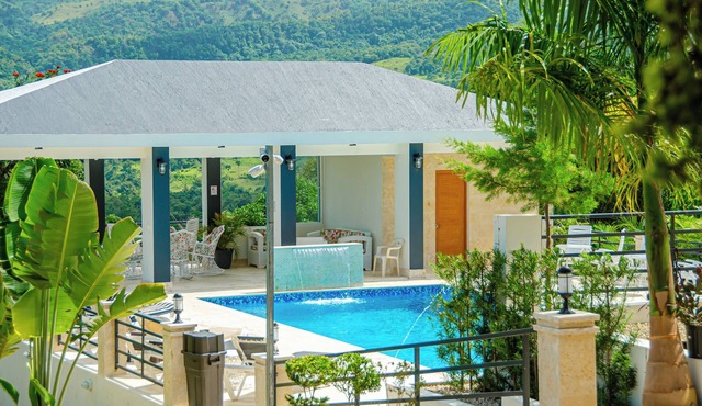 This villa is unmatched! Showcased on four acres of beauty and tranquility!