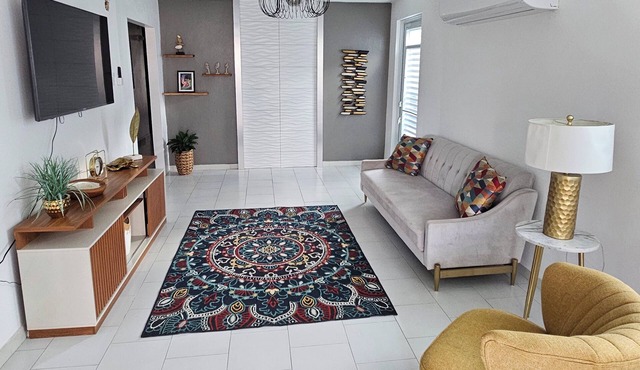 Three-bedroom, two-bathroom residence featuring a fully equipped kitchen