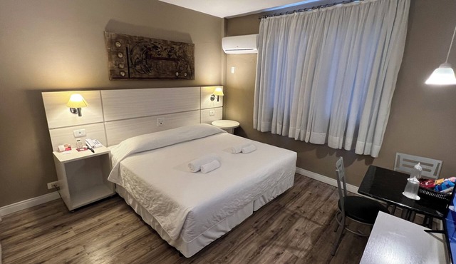 Three Sleek Executive Couple Rooms in Central Hotel Perfect for Group Getaways