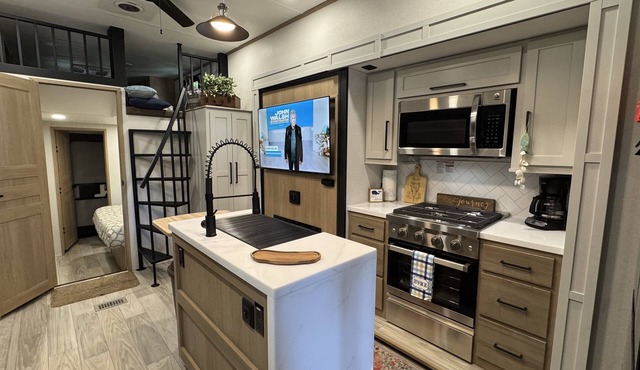 Tiki "Glamping" unit fully stocked RV w/golf cart