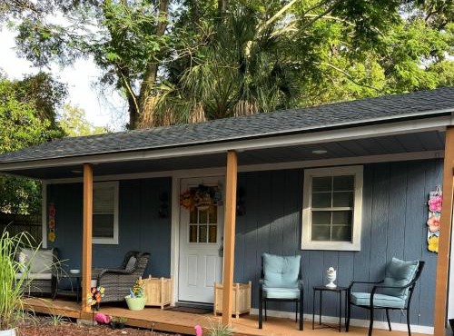 Tiny home barn style in backyard with Animals