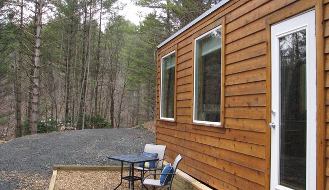 Tiny House On Wheels across from New River
