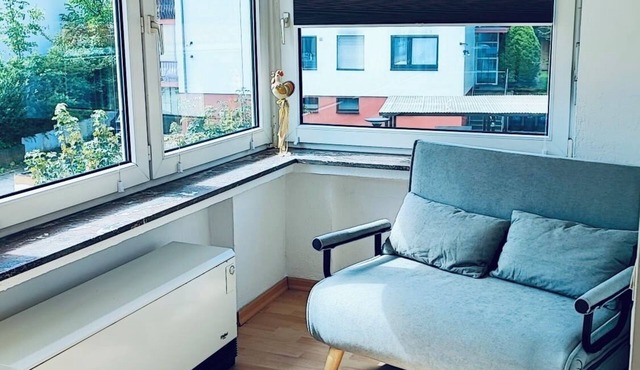 Top floor apartment with conservatory perfect for a couple or one person