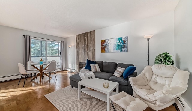 Top Floor Executive Luxury Condo Heated Underground Parking & only 3km’s to Dow