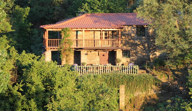 Traditional stone house with pool in central Portugal