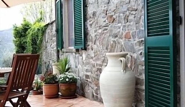 Traditional stone villa with terrace & gardens, in the hills of Lunigiana, Northern Tuscany.