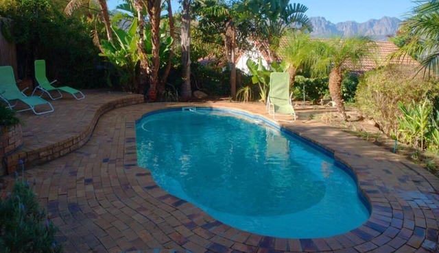 Tranquil, fully-equipped and spacious garden flat with access to pool.