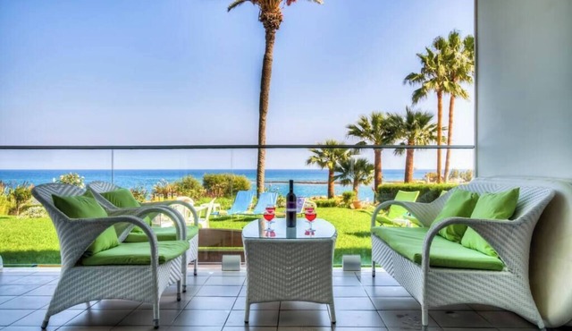 Trident Beach Front Suite is located just a few meters from the quiet beach of Ayia Triada,