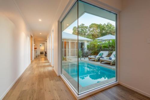 Trinity Beach Coastal Luxe Pool Retreat – 4BR