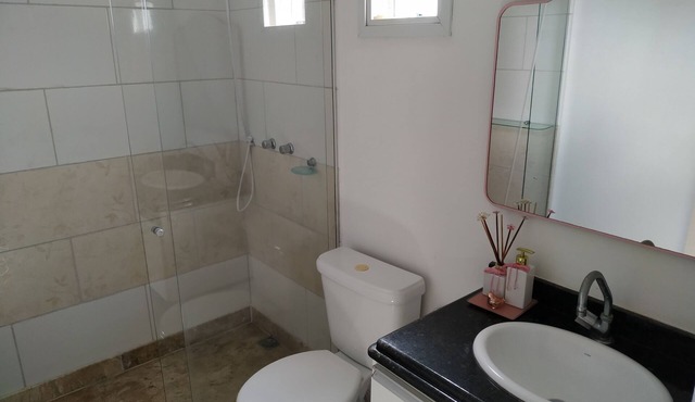 Triplex beach house, 50 meters from the sea with a view, 2 swimming pools and a sauna.