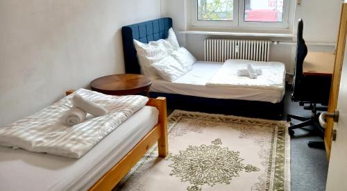 Tripplezimmer mit Garten, Kicker und Grill