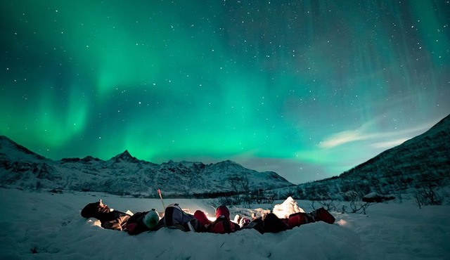 Tromso Aurora Hunt with Bonfire, Meal, Winter Suit & Photos