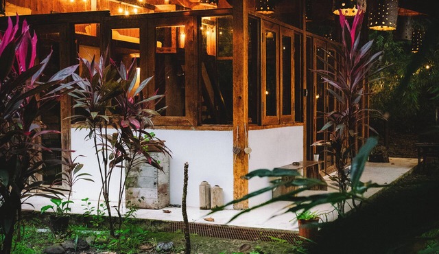 Tropical 2BR Rustic Home with Private Garden & Modern Comforts