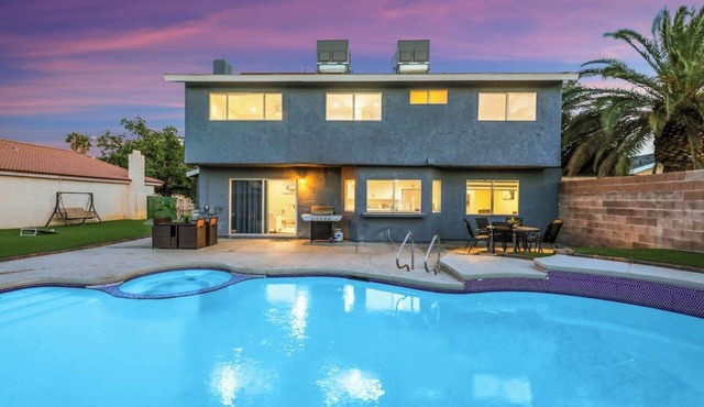 TWAIN AVE · Modern Oasis: Heated Pool & Game Room