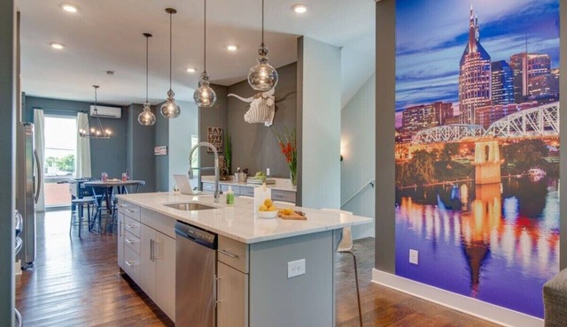 Twin Homes with Airy Rooftops & Photo Ops