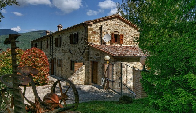 Two characteristic houses on an estate in Umbria