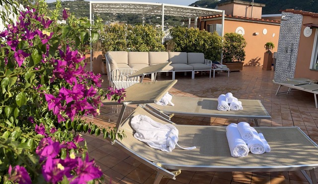 Two Double rooms with private bathrooms and an equipped roof terrace.