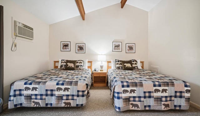 Two Queen Bed Standard Hotel room with outdoor heated pool 201