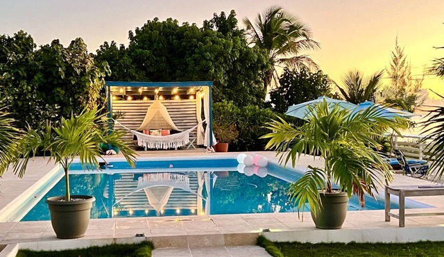 Two villas side by side. Each villa has its own jacuzzi and ocean front pool.