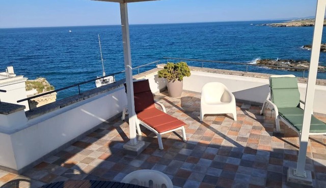 Typical house with terrazzo overhanging seen sea