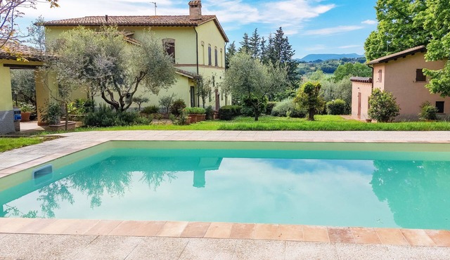 Typical Le Marche region house surrounded by lush greenery, perfect for holidays and relaxation!