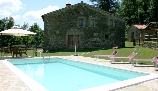 Typical stone farmhouse with private pool and garden situated in a hilly position a few km from the