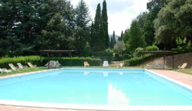Typical Tuscan Villa between wineyards and olive trees