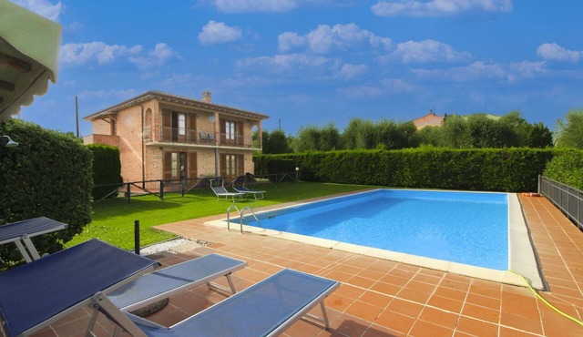 Typical Valdichiana farmhouse in red bricks, near the border between Tuscany and Umbria and a few km