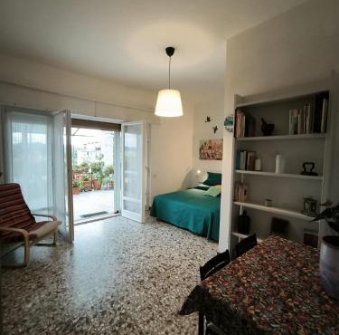 Una Terrazza tra Fiori e Cielo